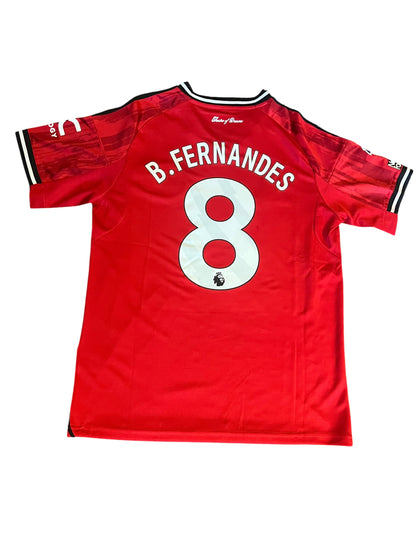 rm memorabilia Manchester United home football shirt with Bruno Fernandes name and number 8 on the back