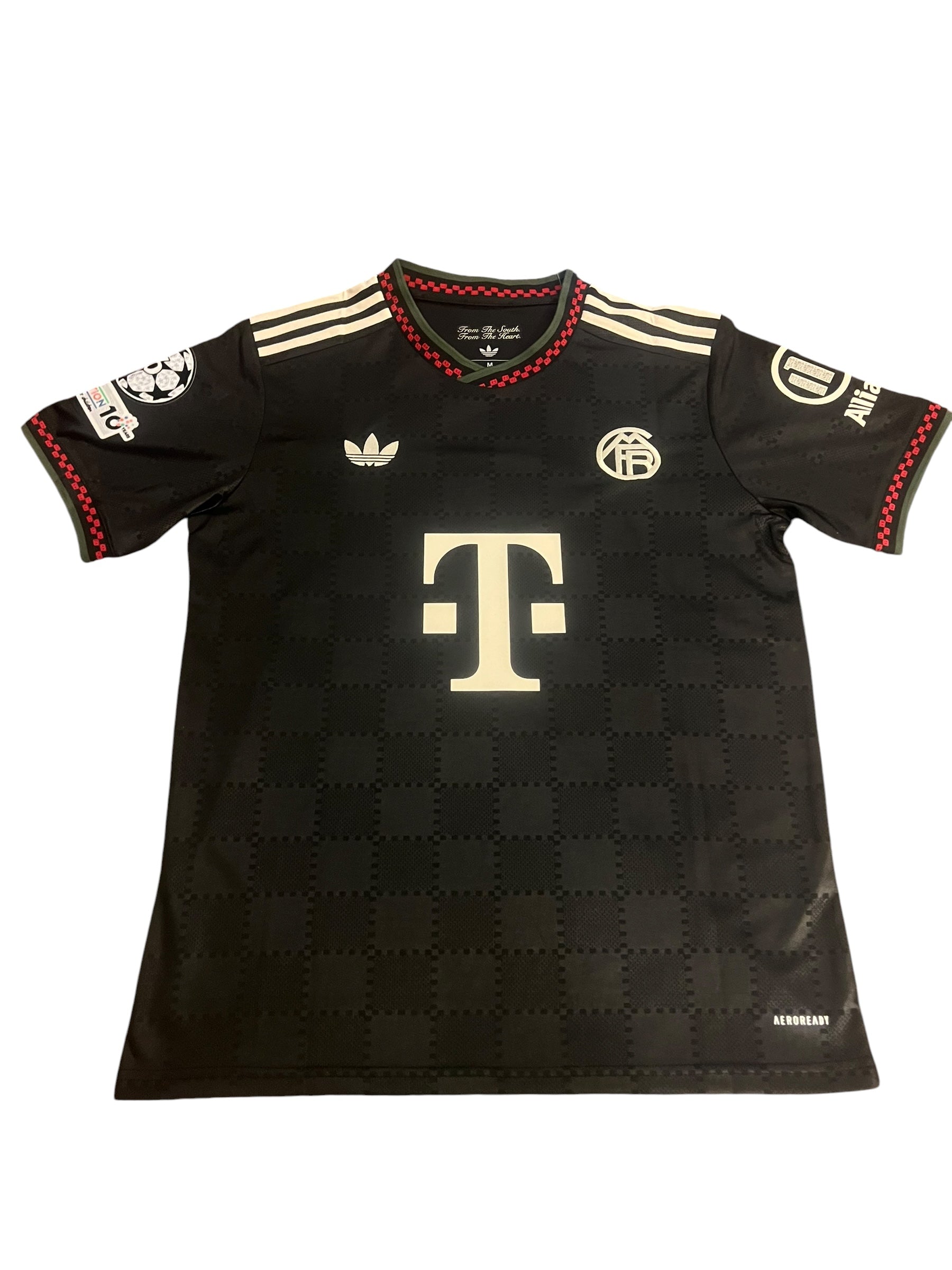 rm memorabilia FC Bayern Munich Michael Olise black football jersey with checkered pattern and white detailing