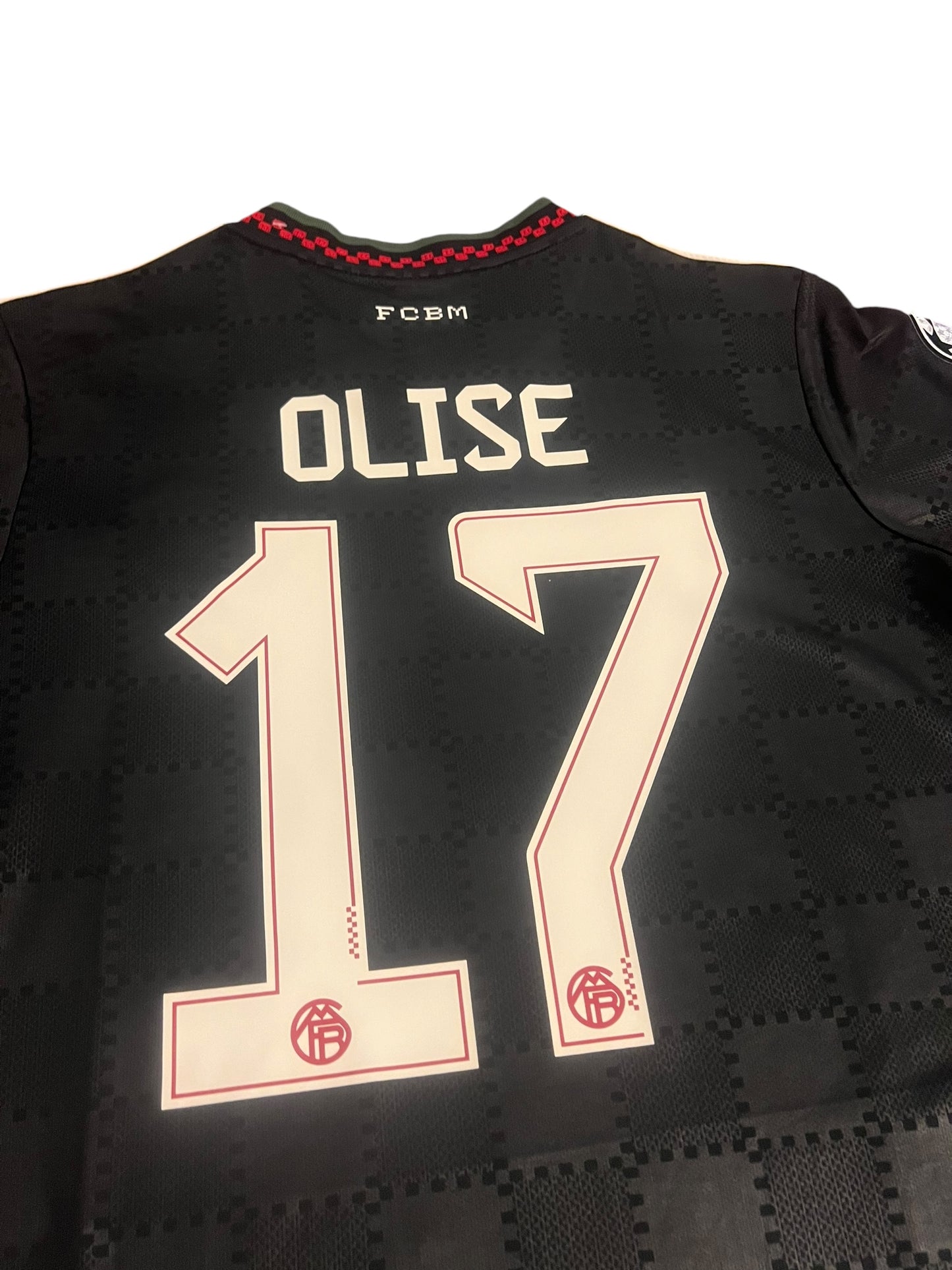 rm memorabilia FC Bayern Munich Michael Olise 17 black football jersey with white lettering and checkered pattern